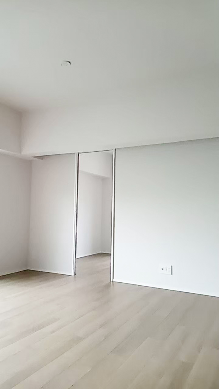 明石市のマンションリノベーション事例|引戸で仕切る白基調のシンプルな洋室|TEAM-R